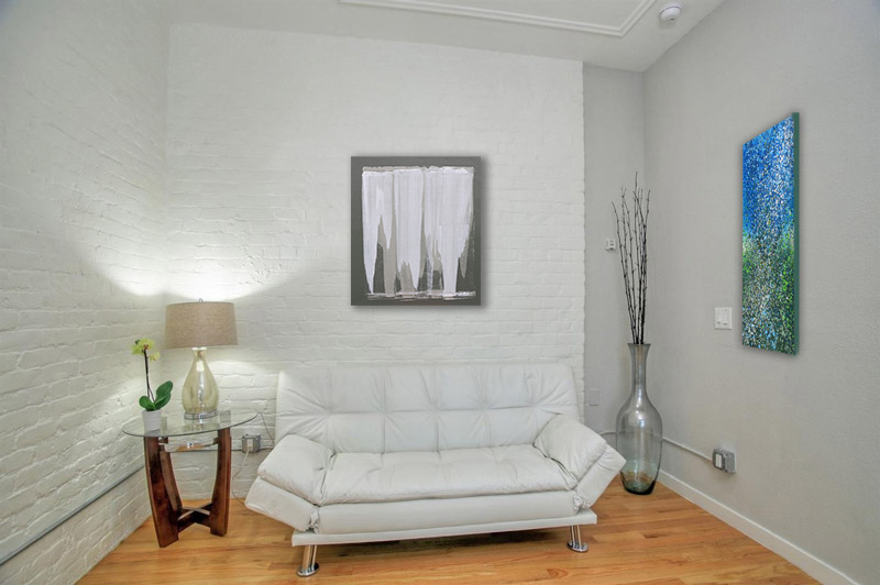 "Poise" hanging over sofa