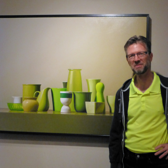 Peter J. O'Halloran with one of his "Stuff on a Shelf" paintings