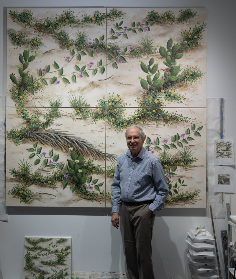 Charles Reinike with "Dune Life" above and Dune Life" study on floor, preliminary sketches on side.